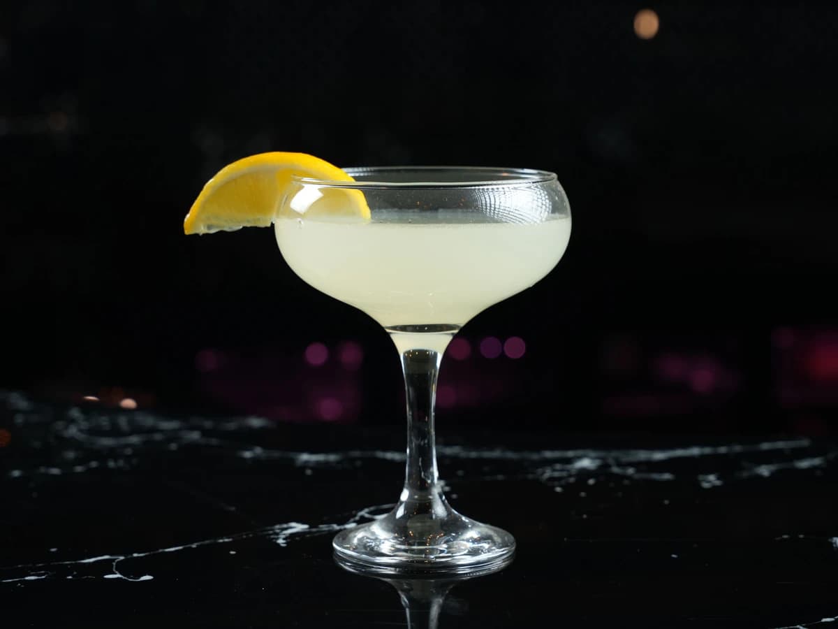 A Corpse Reviver No. 2 in a chilled coupe glass with a lemon twist