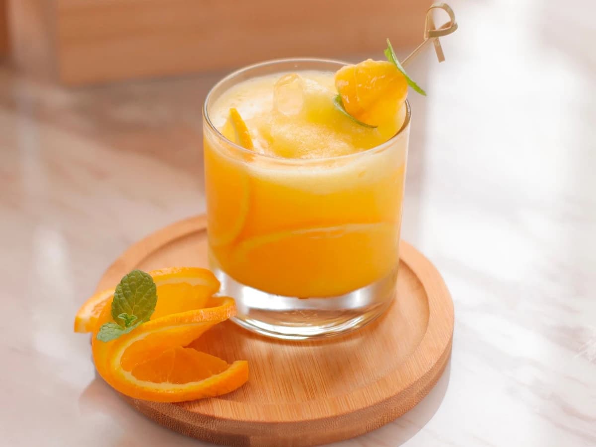 A Harvey Wallbanger in a highball glass with a golden Galliano float on top